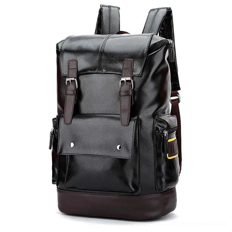 Black gothic backpack three-quarter view with yellow accent patches on side pockets and brown base trim