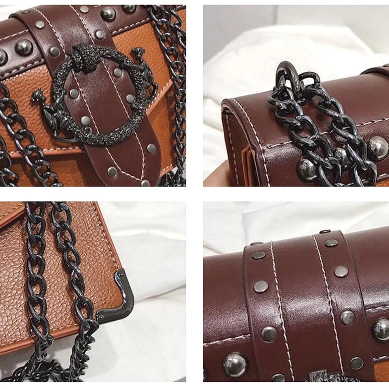Gothic studded square shoulder bag showing panelled leather construction and vintage metal chain attachment