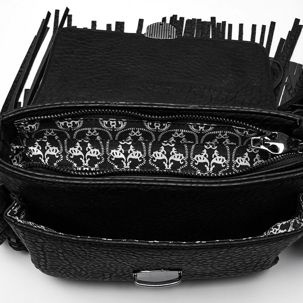 Gothic skull tassel bag interior showing printed fabric lining, metal zipper, detachable inner pouch