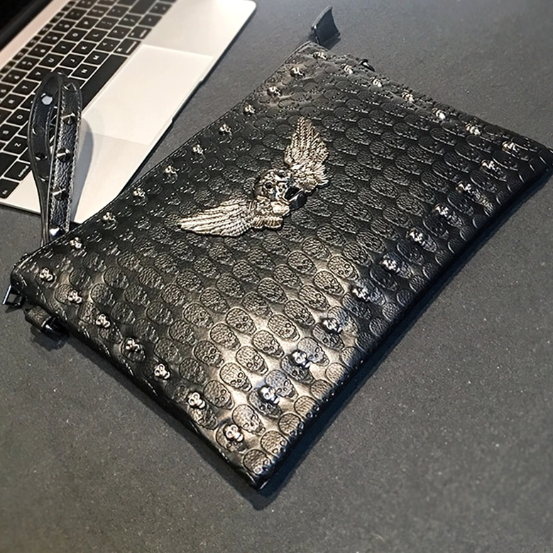 Black moto-gothic shoulder bag side view showing metal studs and embossed leather texture detail