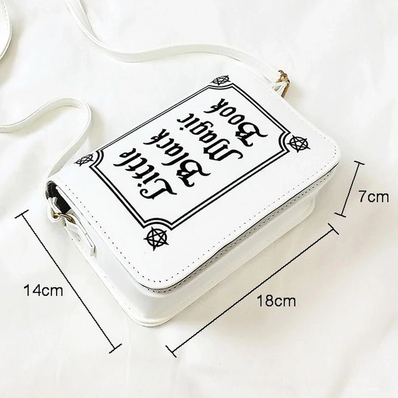 White gothic crossbody bag 3/4 side view showing adjustable strap and metal hardware with size dimensions 18x14x7cm