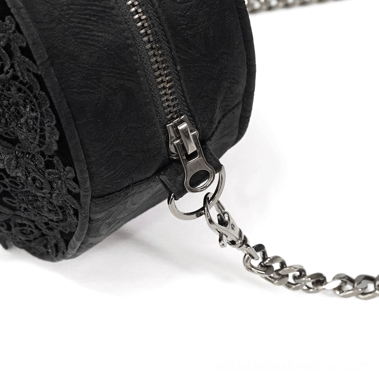 Side close-up detail of black lace synthetic leather, premium metal zipper, and chain connector on gothic round bag
