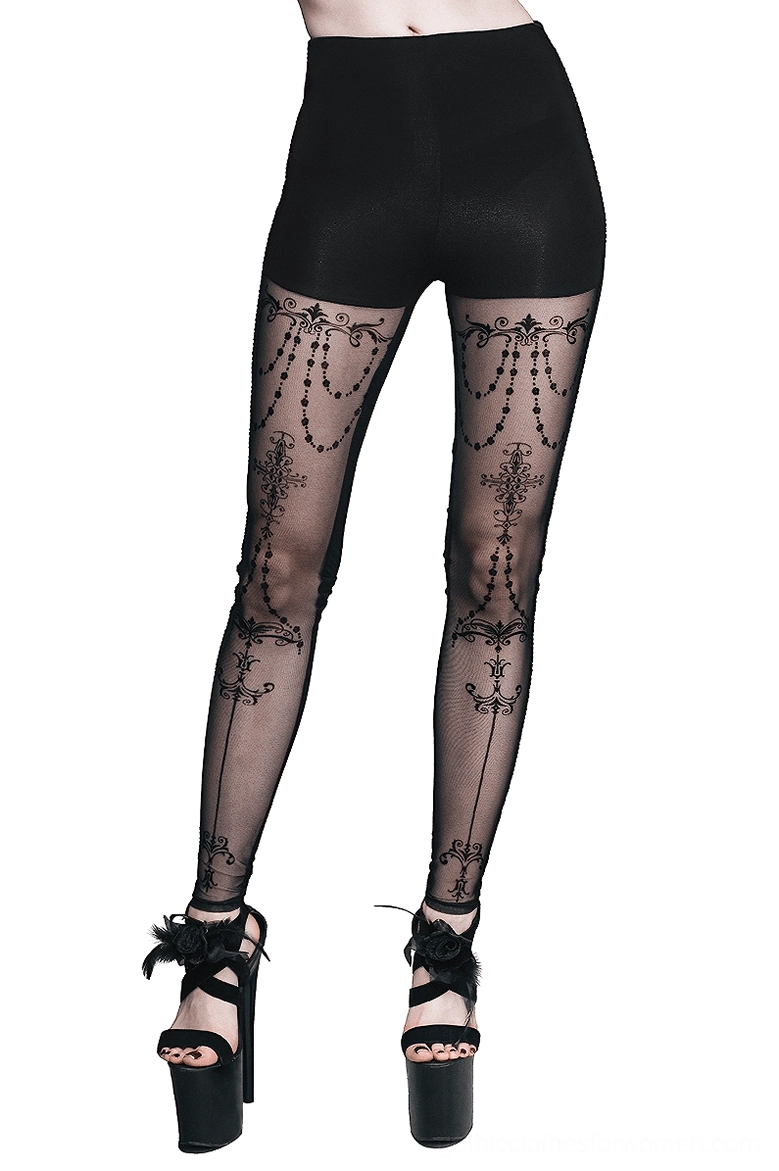 Black gothic baroque mesh leggings with chain print and transparent panels, worn on female model in full-body front view with white studio background