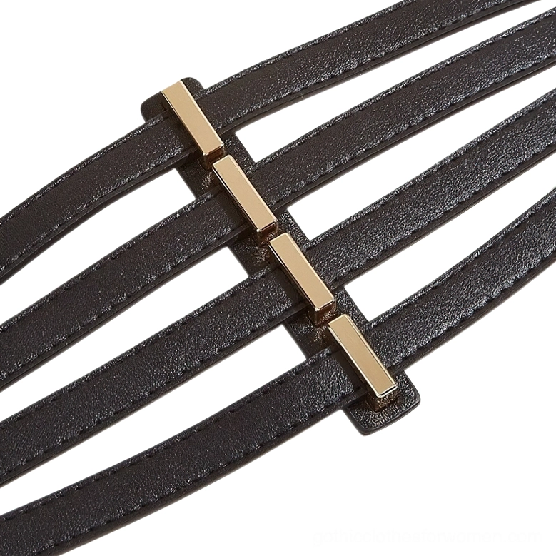 Close-up detail of black corset belt buckle area showing faux leather straps and gold metal fasteners with stitching