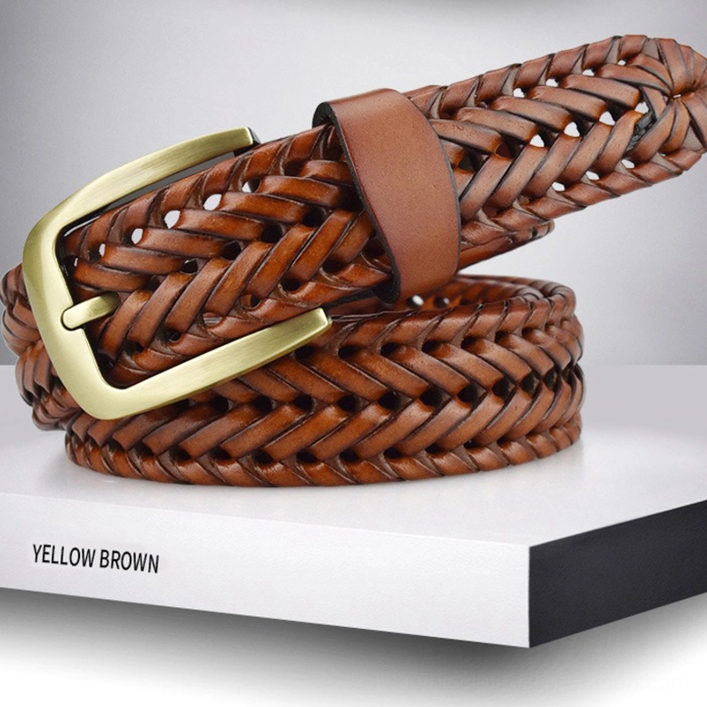 Gothic hand-braided leather belt texture and construction detail with metal buckle, artistic studio lighting