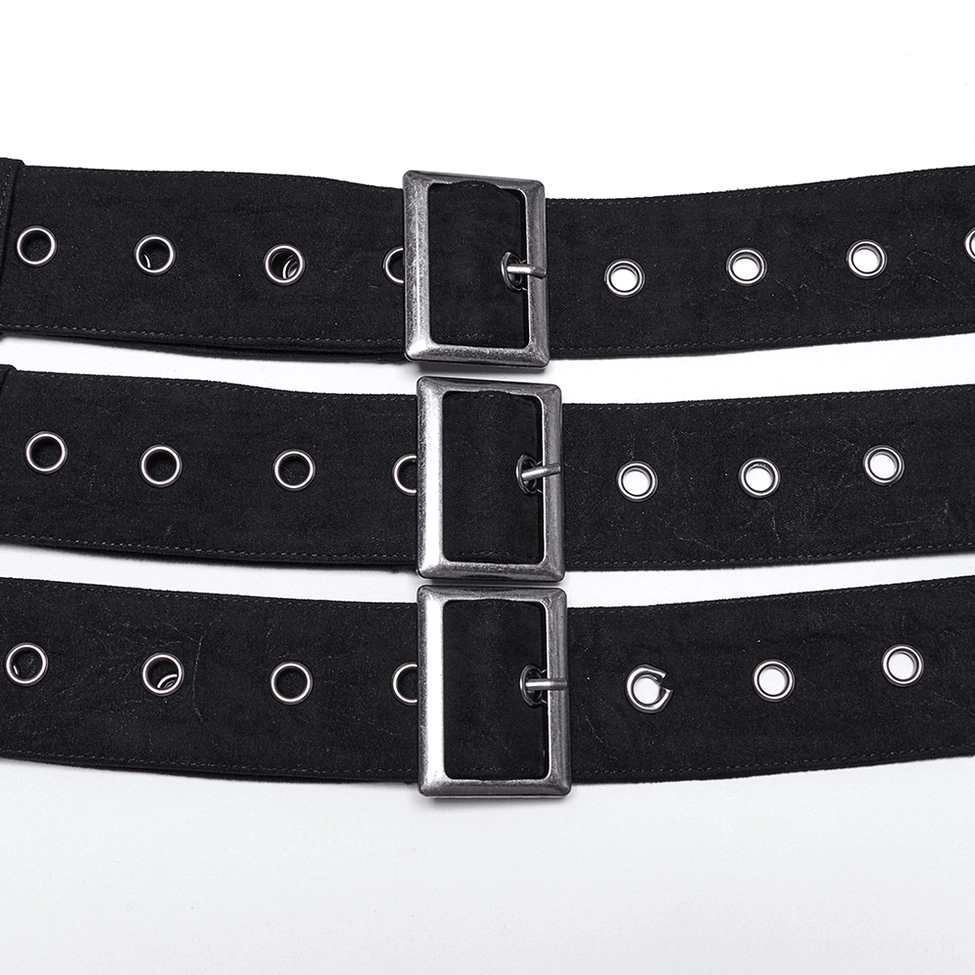 Close-up of gothic punk belt metal square buckles and grommet holes detail shot