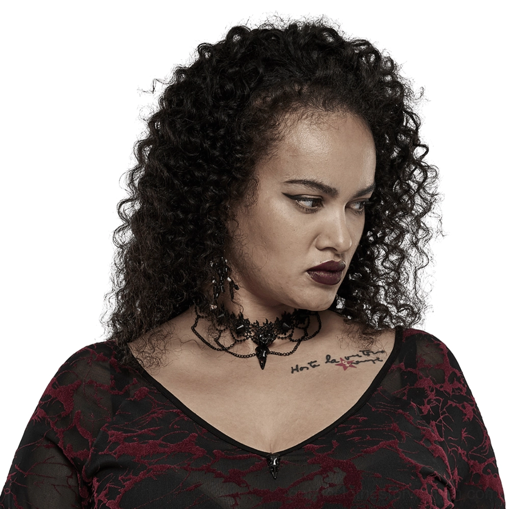 Victorian gothic lace choker with matte black bird skull pendant, side profile worn by alternative model
