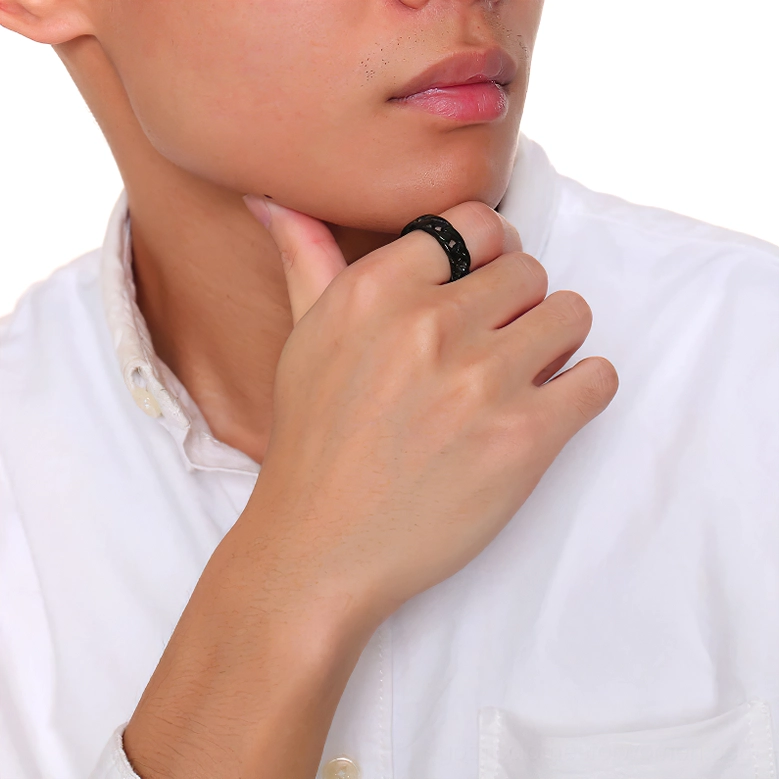 Black gothic chain ring worn on male model's hand, close-up wearing effect demonstration on index finger