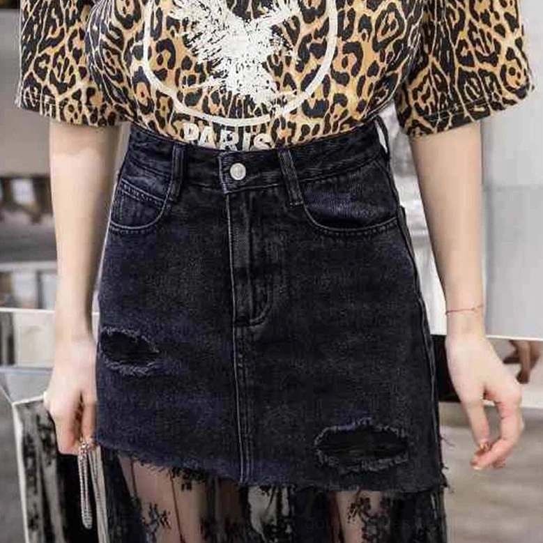 Black gothic denim midi skirt high waist close-up - front detailed view of distressed overlay and floral lace hem construction