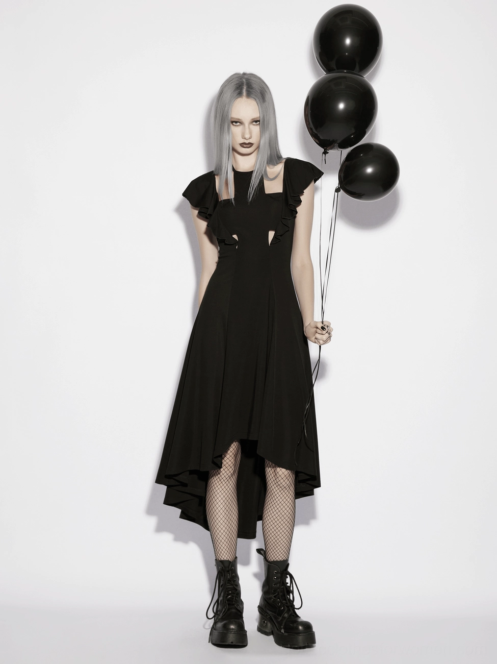 Black gothic dress full-length view on model showcasing high-low hemline and alternative style aesthetic
