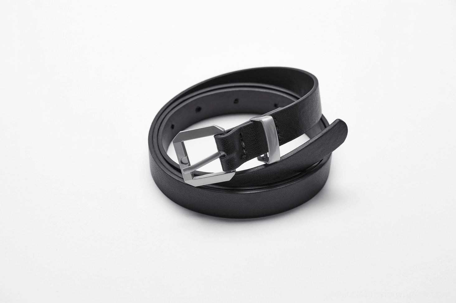 Black leather waist belt accessory with silver metal buckle for gothic midi skirt, flat lay top-down product shot on white background