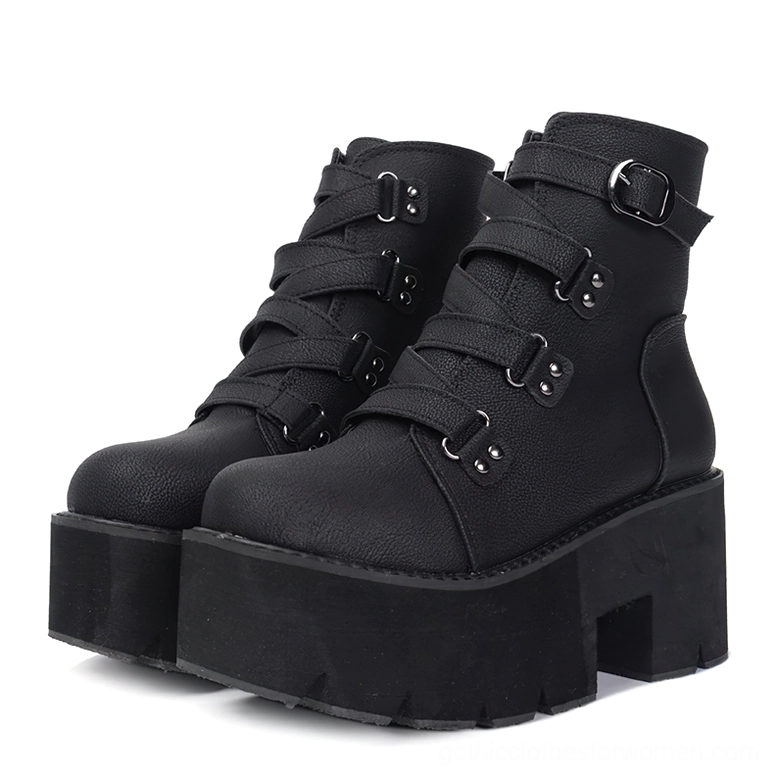 Black gothic platform ankle boots with multiple buckle straps, chunky block heel and lugged sole, front three-quarter view