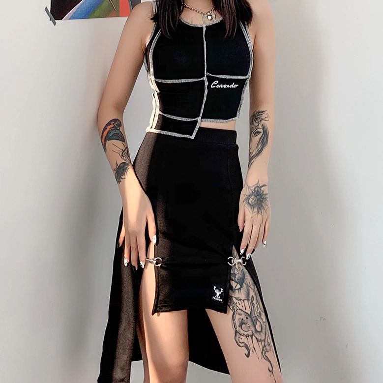 Front three-quarter model pose showcasing gothic black skirt with dual split design and contrast stitched styling