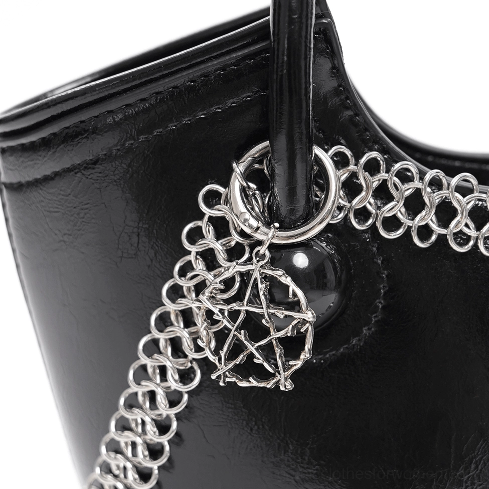 Gothic black tote bag showing skull charm details and silver chain embellishments, angled product view
