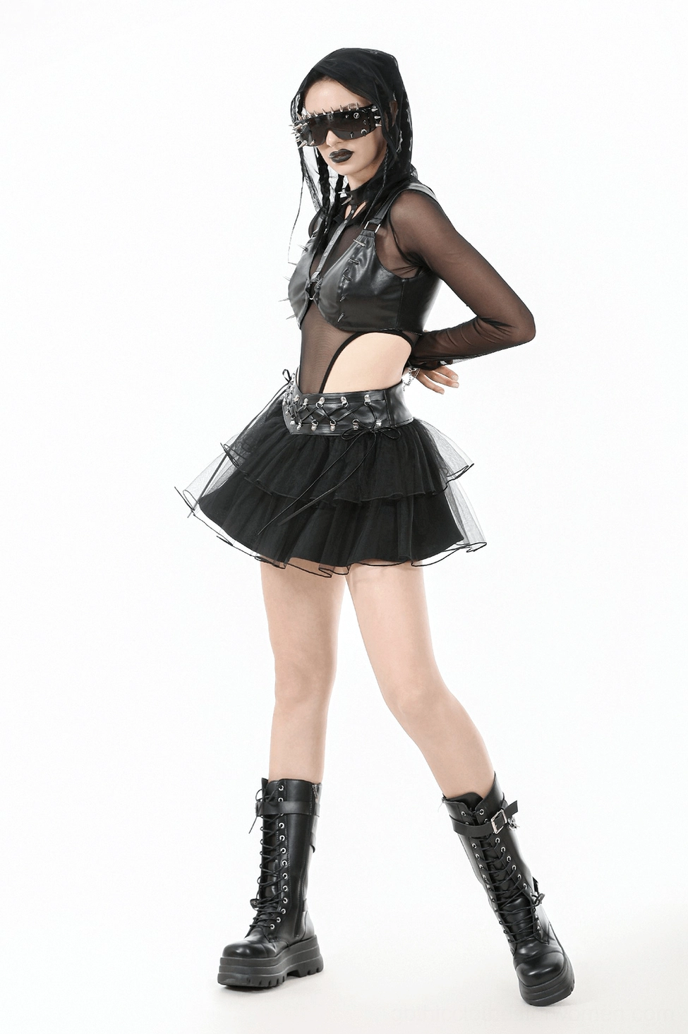 Black gothic tulle mini skirt featuring harness straps and layered ruffled construction for alternative and punk fashion