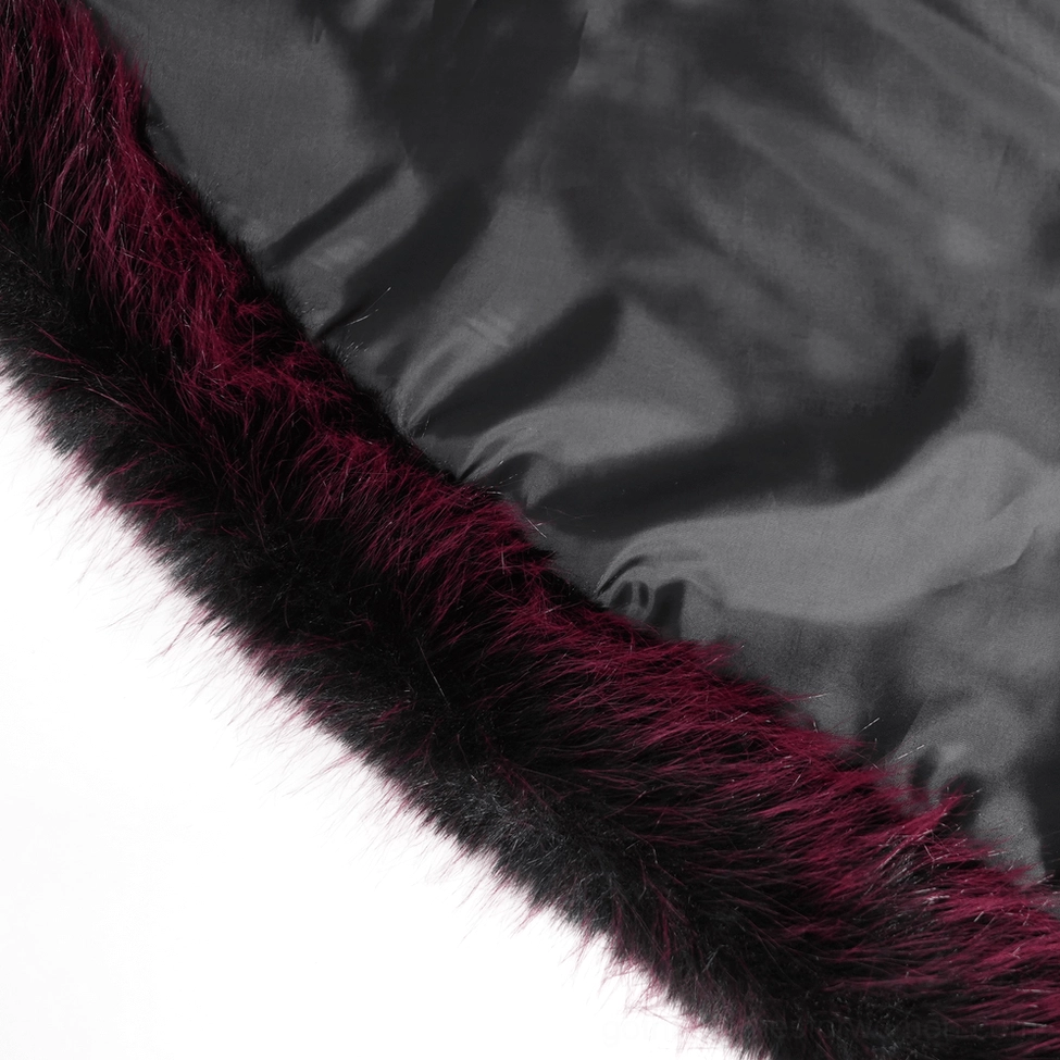 Flat lay display showing full back of black velvet gothic coat with burgundy fur-trimmed hem and high-low hemline design
