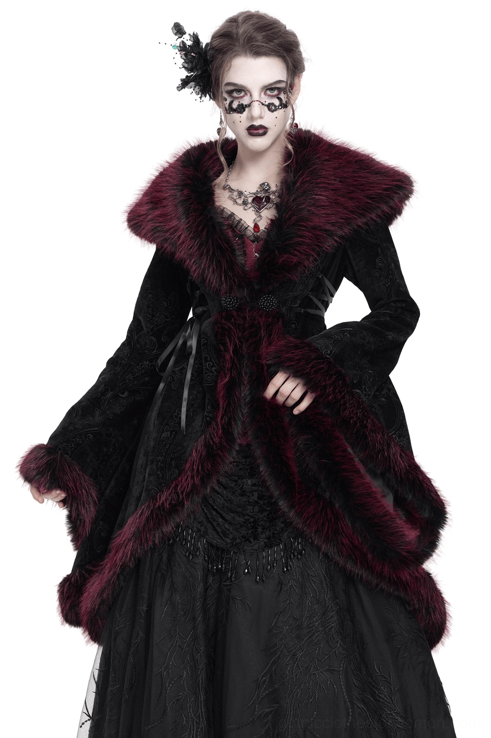 Gothic black velvet coat with burgundy faux fur collar and trim, worn by model in front pose showing full-body silhouette and detailed embellishments