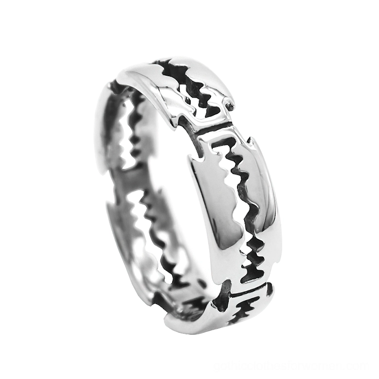 Stainless steel blade ring with sawtooth texture, polished silver finish, oblique close-up on white background, gothic punk jewelry