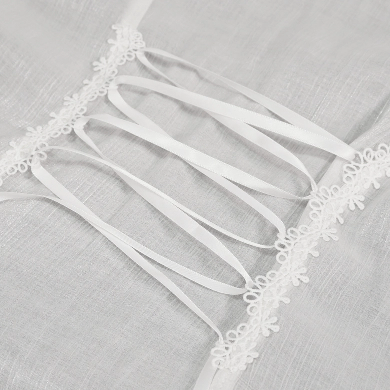 Macro photograph of ivory gothic blouse back lace detail showing ribbon lace-up design and intricate trim work on reverse side