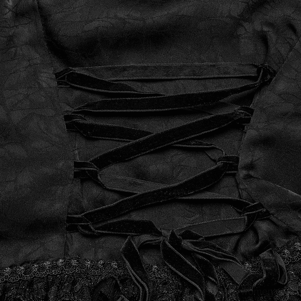 Close-up of gothic blouse back lacing showing velvet ribbon corset ties and lace hem trim