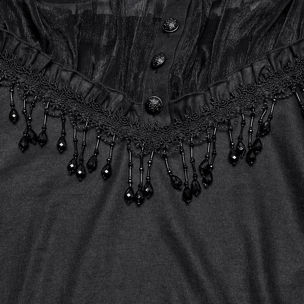 Black gothic blouse front trim detail showing beaded tassel lace edging with decorative buttons