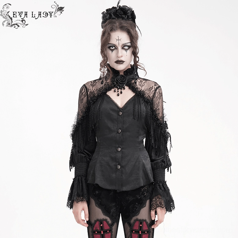 Front close-up of Victorian gothic blouse beaded tassel neck pendant against intricate lace and damask fabric detail