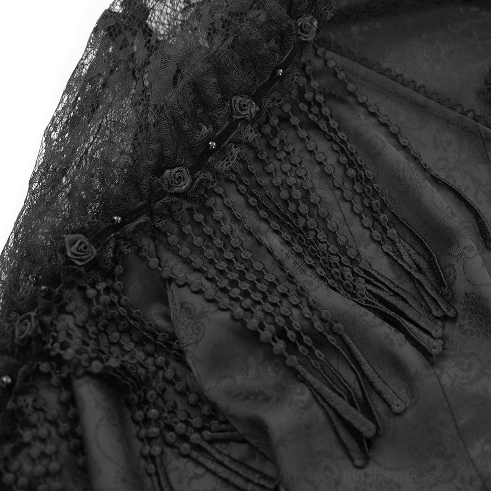 Gothic blouse bubble sleeve with sheer lace detailing and delicate cuff embellishments on dress form display