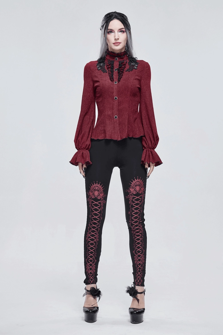 Wine red gothic blouse showing button placket and front design elements in detail