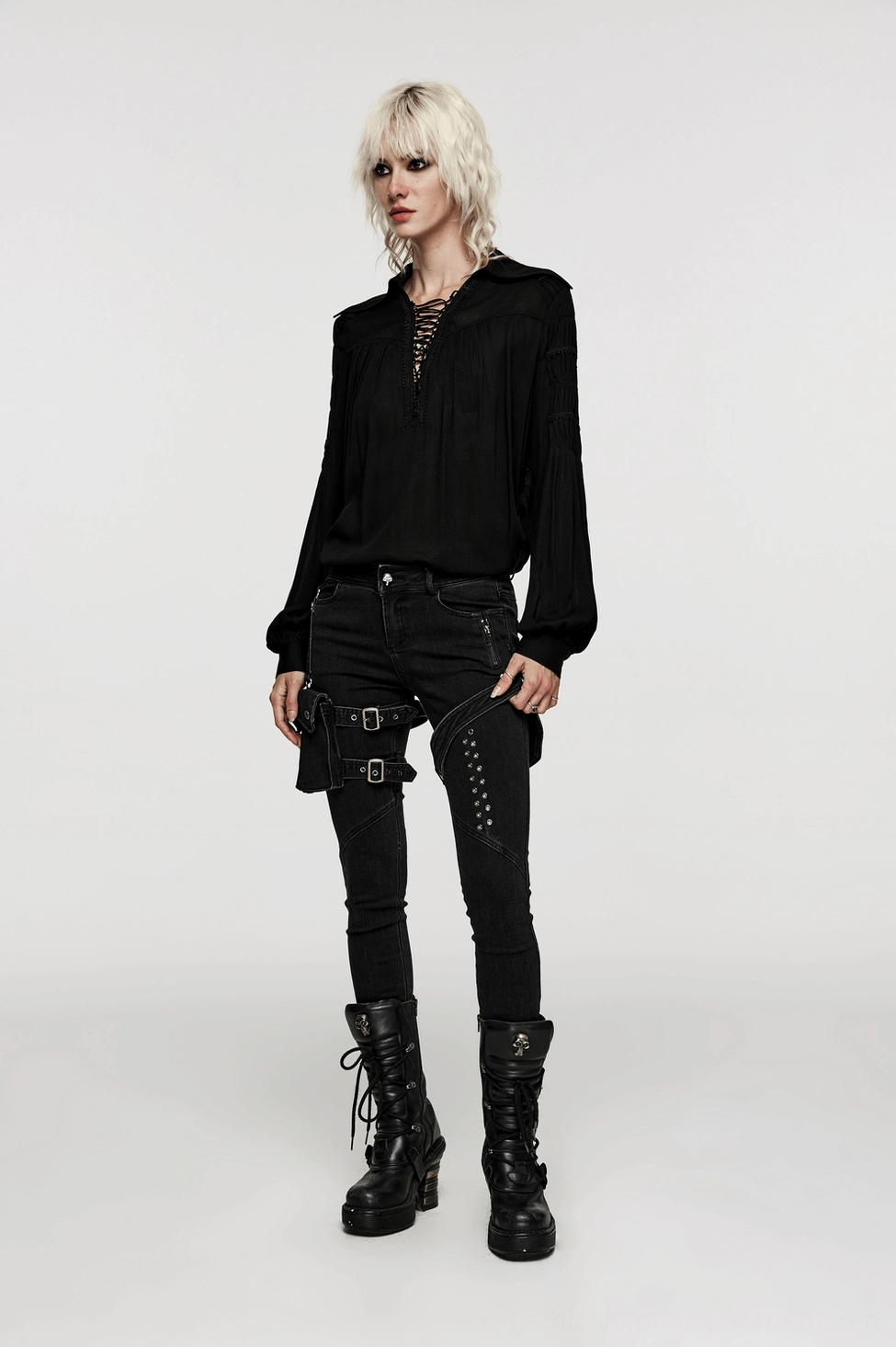 Black gothic lace-up blouse full front view on model displaying complete design with pointed collar and pleats