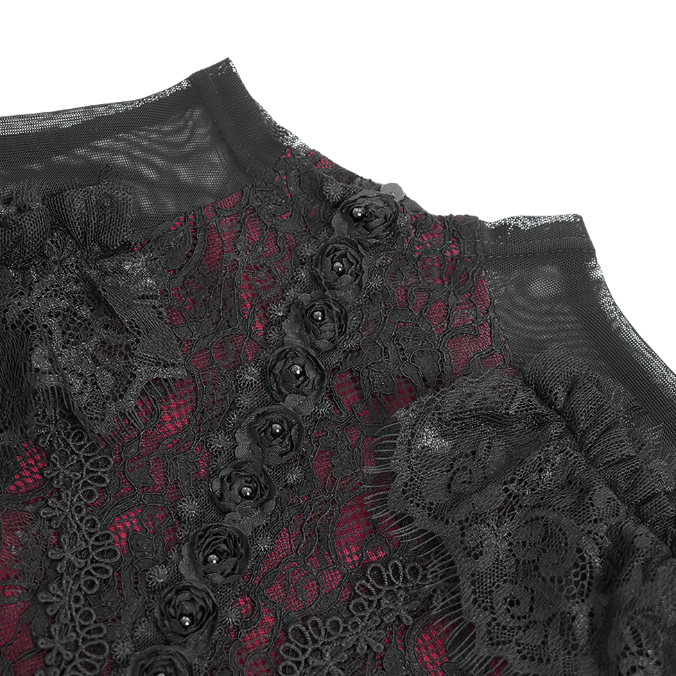 Close-up detail shot of gothic blouse front featuring ornamental rosette buttons, delicate floral lace overlay, and mesh neckline panel