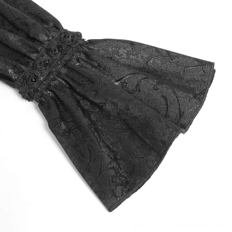 Close-up of gothic blouse flared cuff, ruffled sleeve edge detail, floral lace texture