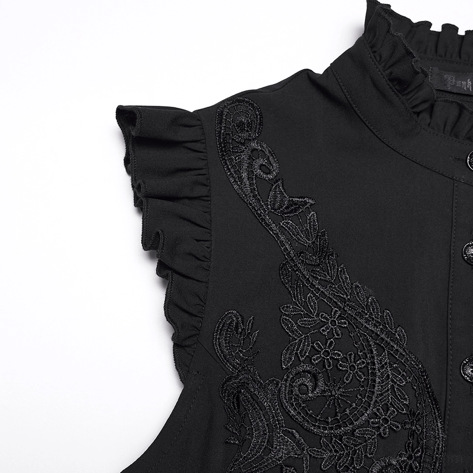 Gothic blouse shoulder and sleeve detail - close-up of flying shoulder ruffle and floral embroidery