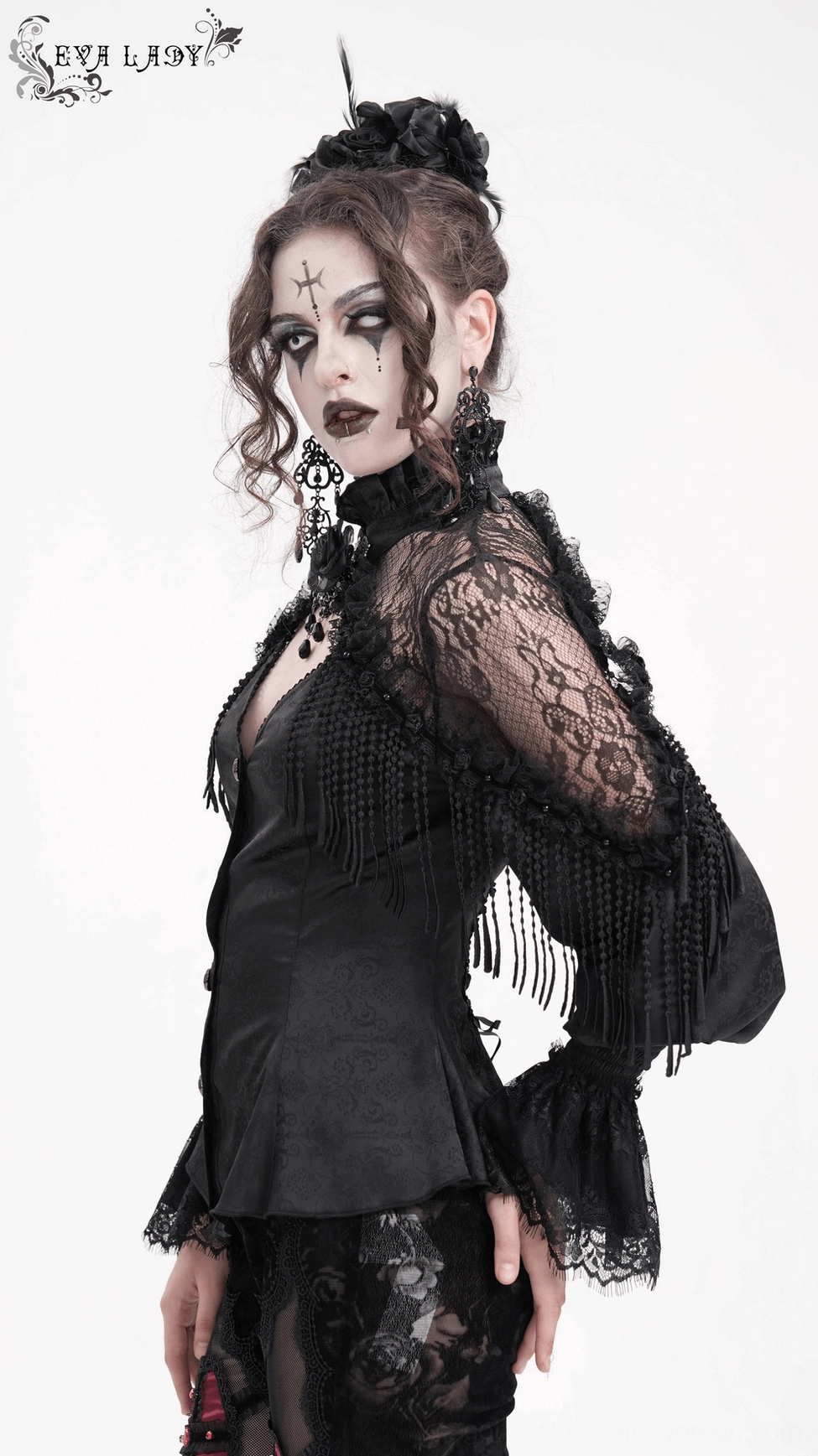 Detail shot of gothic blouse fringe trim, damask pattern, and layered lace construction highlighting premium craftsmanship