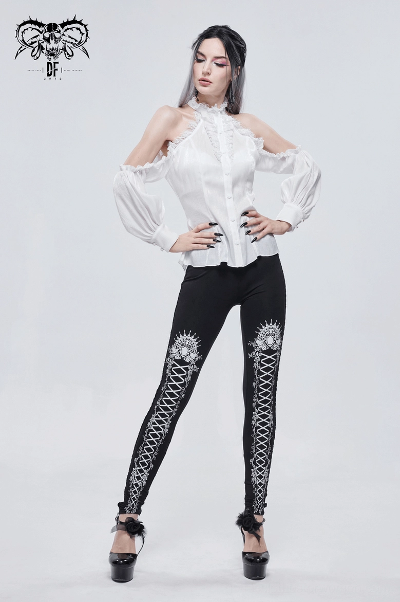 Detail shot of ivory gothic blouse front bodice showing button closure, lace panel integration, and stand collar framing