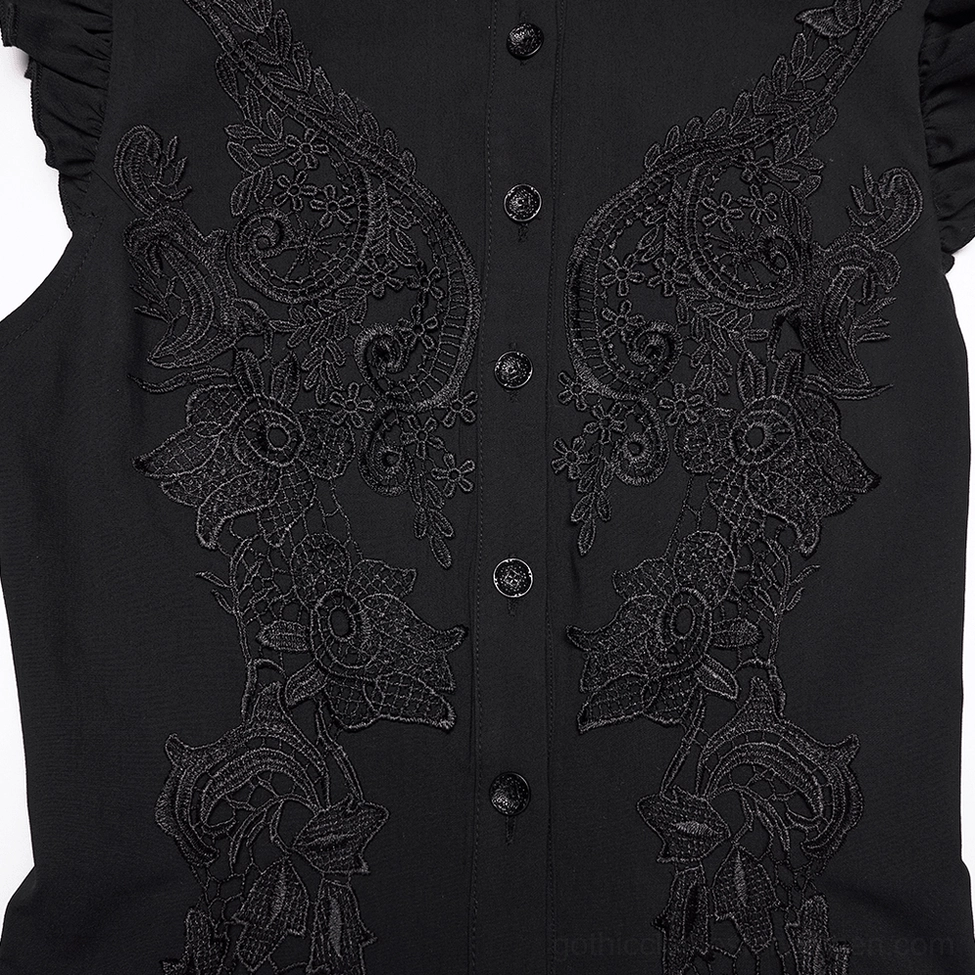 Black gothic blouse front placket close-up - intricate floral embroidery and button fastening detail