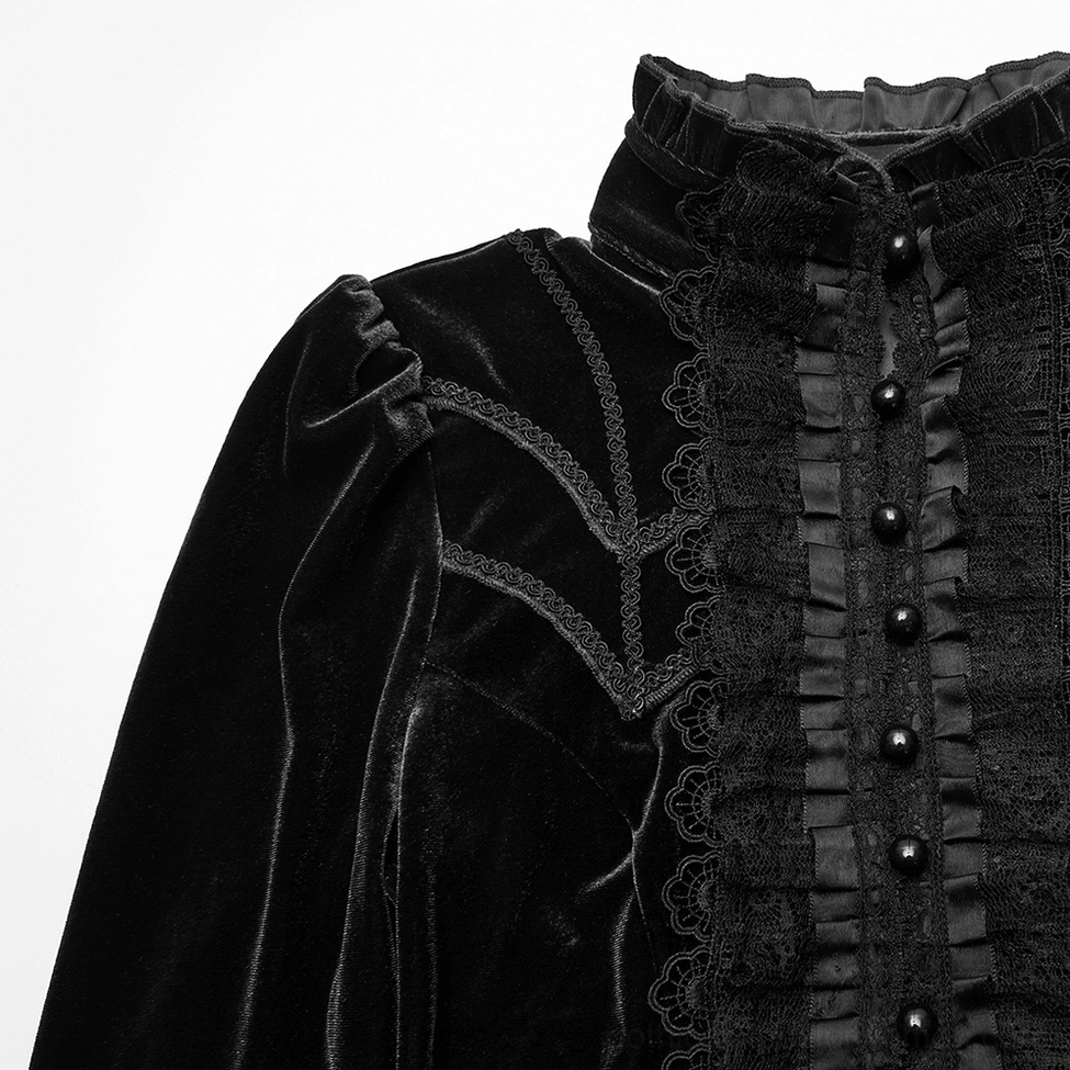 Close-up of black velvet gothic blouse front placket displaying embroidery stitching, ruffled lace trim, and decorative pearl buttons