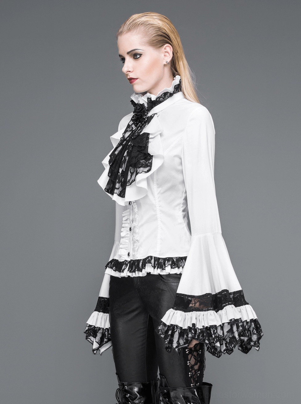 Detailed view of white gothic blouse's lace collar ruffle and black tie neck jabot styling options