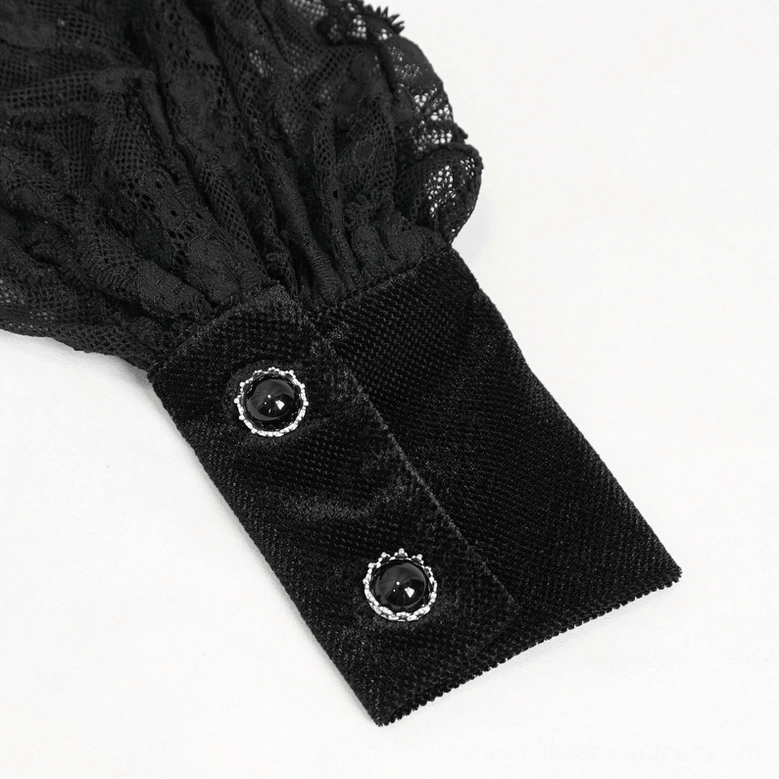 Cuff detail of gothic lace velvet blouse showing two gemstone buttons, velvet cuff trim, and gathered black lace sleeve opening