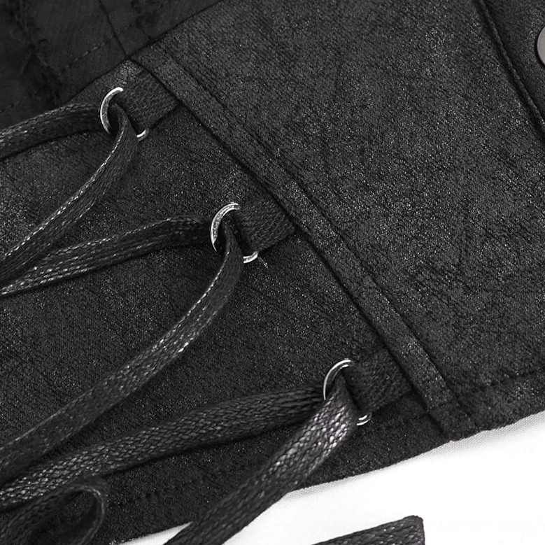 Close-up of black gothic blouse waist lace-up detail with faux leather straps and metal eyelets