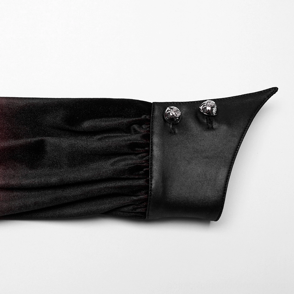 Pointed leather cuff with decorative metal buttons detail of Gothic velvet blouse