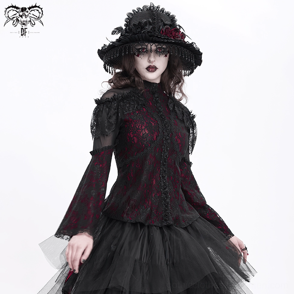 Detail shot of gothic cold shoulder blouse sleeve and shoulder area featuring sheer mesh, ruffled trim, and lace overlay pattern