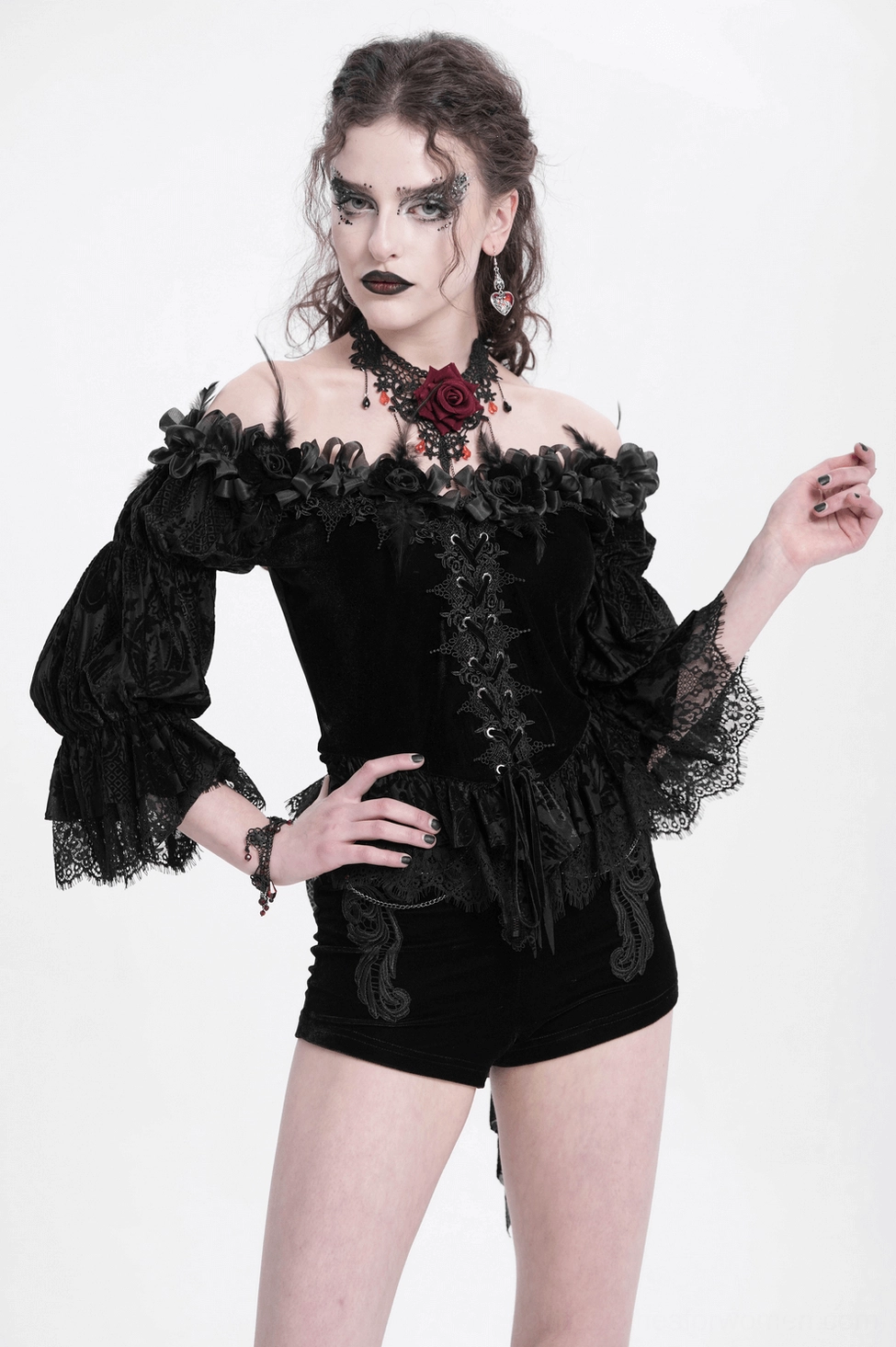 Black gothic velvet blouse model wear showing off-shoulder style, lace-up closure, and rose embellishment at neckline