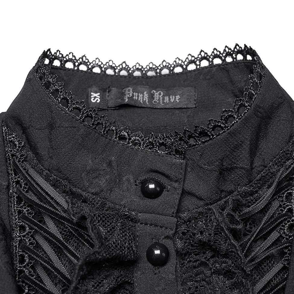 Scalloped lace neckline trim close-up detail on gothic women's blouse with black buttons