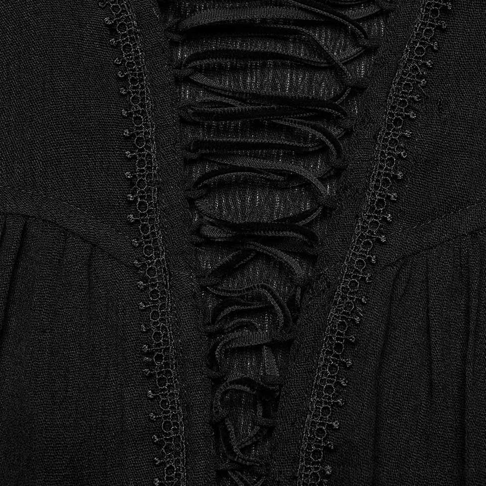 Close-up detail of gothic blouse neckline showing braided lace trim and embroidered edge finishing