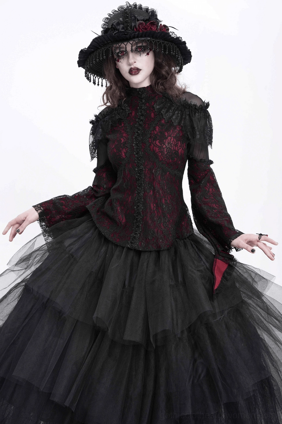 Close-up of gothic blouse neckline and upper chest area showing rosette button details, floral lace, and mesh panel construction