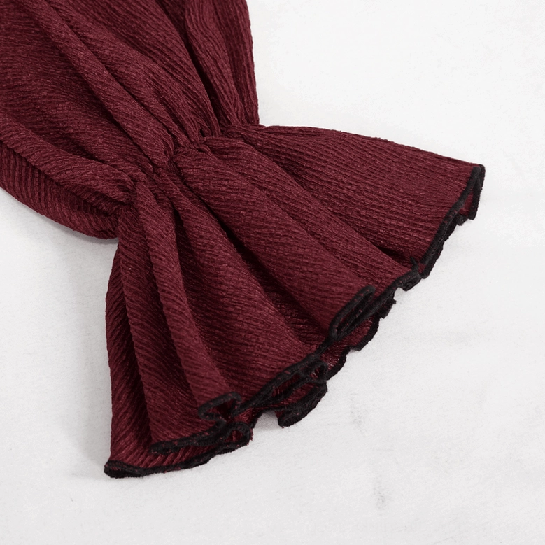 Detailed view of gothic blouse flared ruffled cuff with black lace edge trim