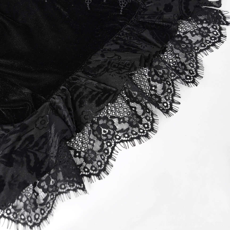 Gothic blouse detail photograph showing ruffled puff sleeve lace construction and sheer overlay details