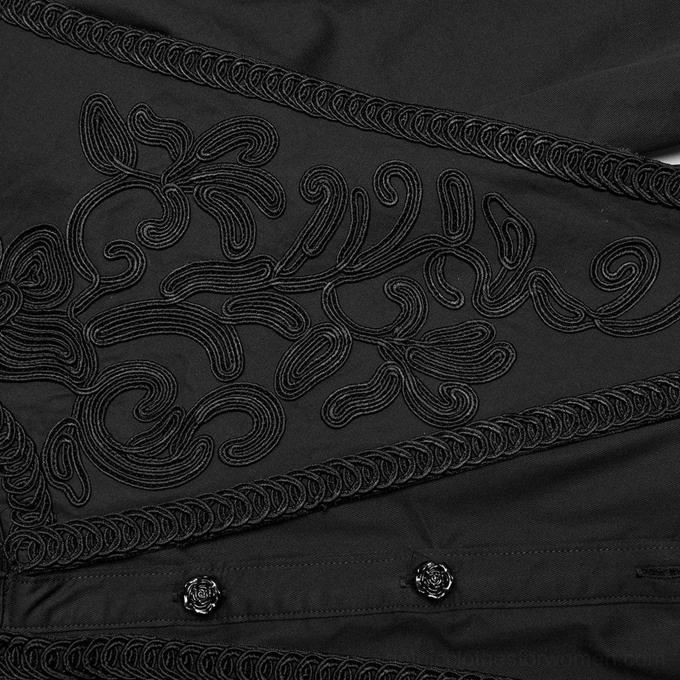 Close-up detail of gothic blouse embroidery with scrollwork and braided trim accents