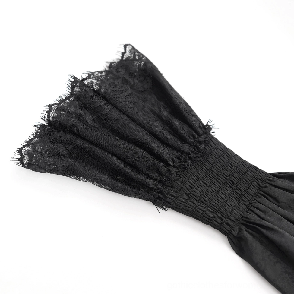 Side profile view of black lace Victorian gothic blouse on model showcasing blouse length, sleeve volume, and corset back profile