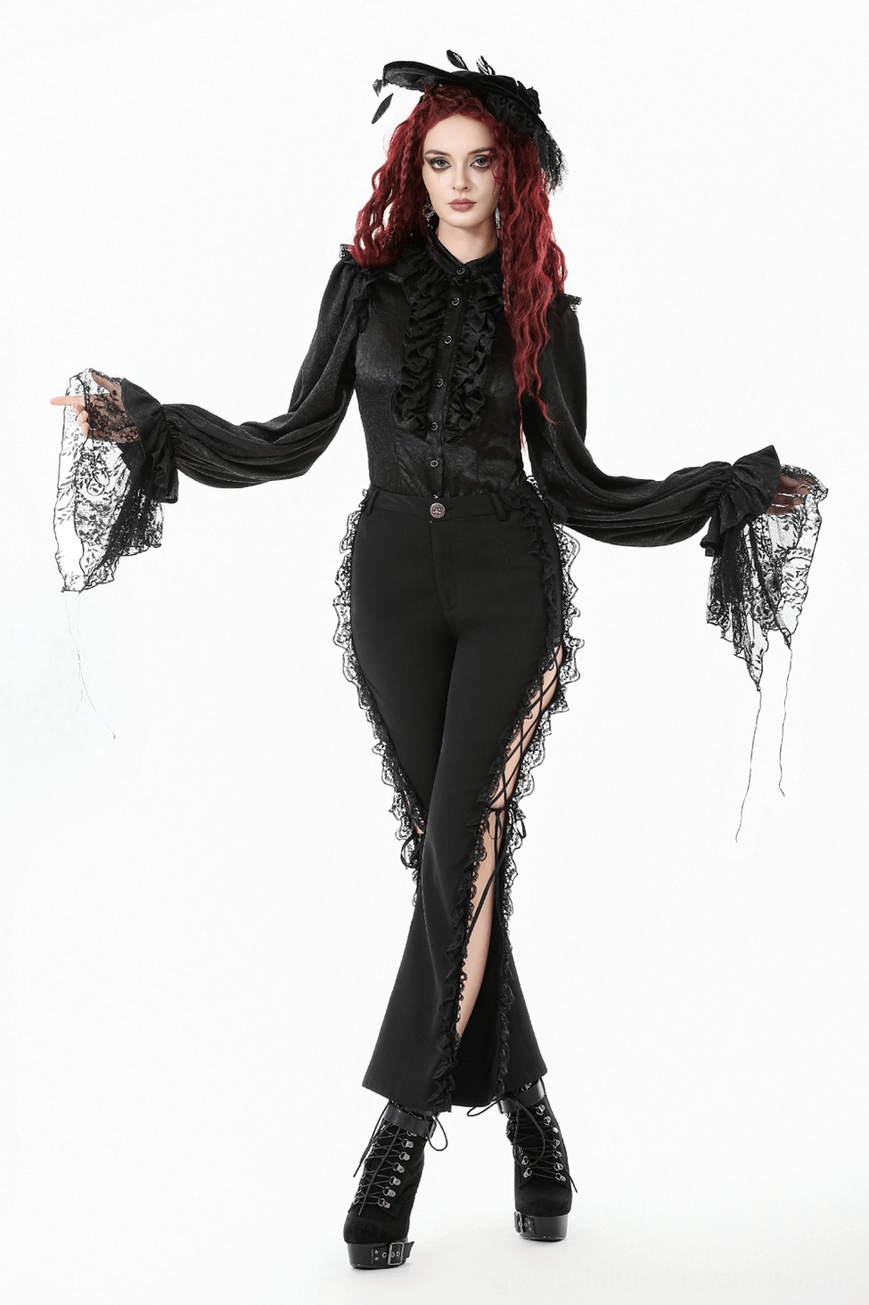 Side view of model wearing black gothic victorian blouse with feather fascinator accessory styling